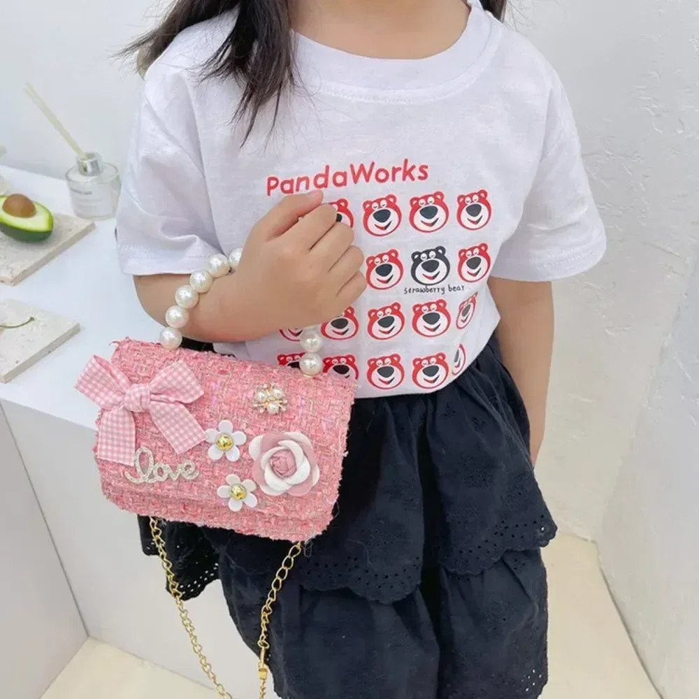 Color: black - New Children's Fashion Little Fragrant Wind Elsa Princess Bag Little Girl Pearl Handheld Crossbody Bag Net  Red envelope