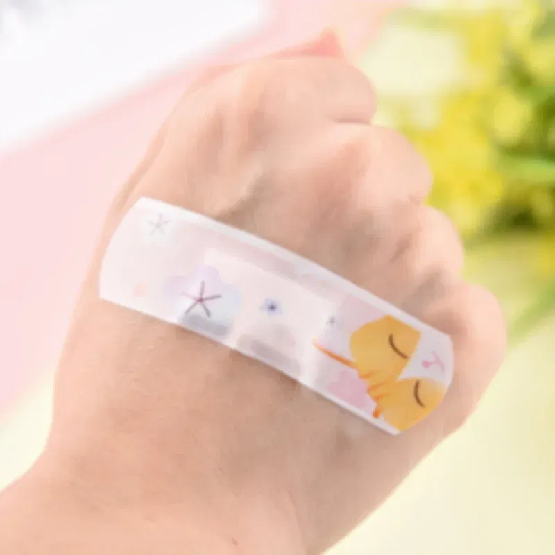 Color: Blue - 20pcs/lot Kawaii Cartoon Dinosaur Pattern Self-adhesive Band Aid Hemostasis Bandages Dressing Patches Tape Plaster for Children