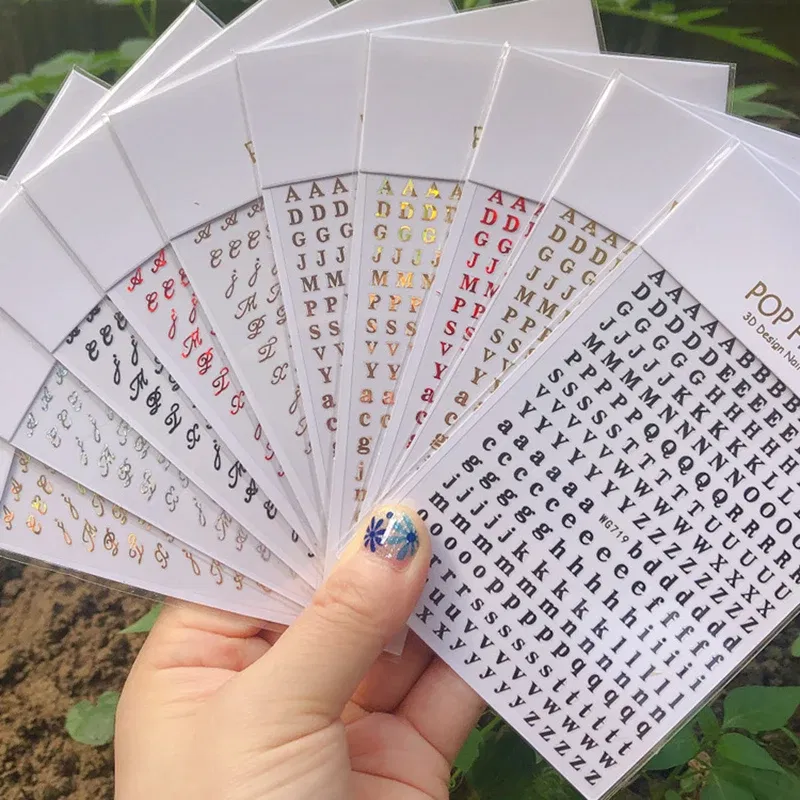 Color: WHITE - 1PCS New English Alphabet Nail Stickers Multi-Color Laser Reflective Nail Slider Art Cool Text Nail Kit