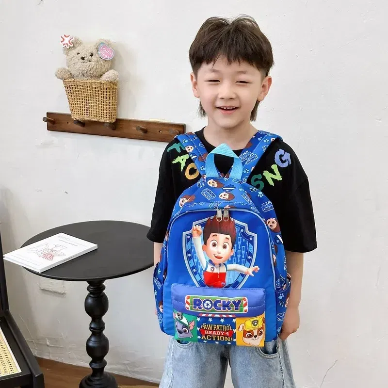 Color: Beige - PAW Patrol Original Backpack Skye Chase Schoolbag Anime Figure Boys Girls Puppy Patrol Doll Cute Cartoon for Children Toys Gifts
